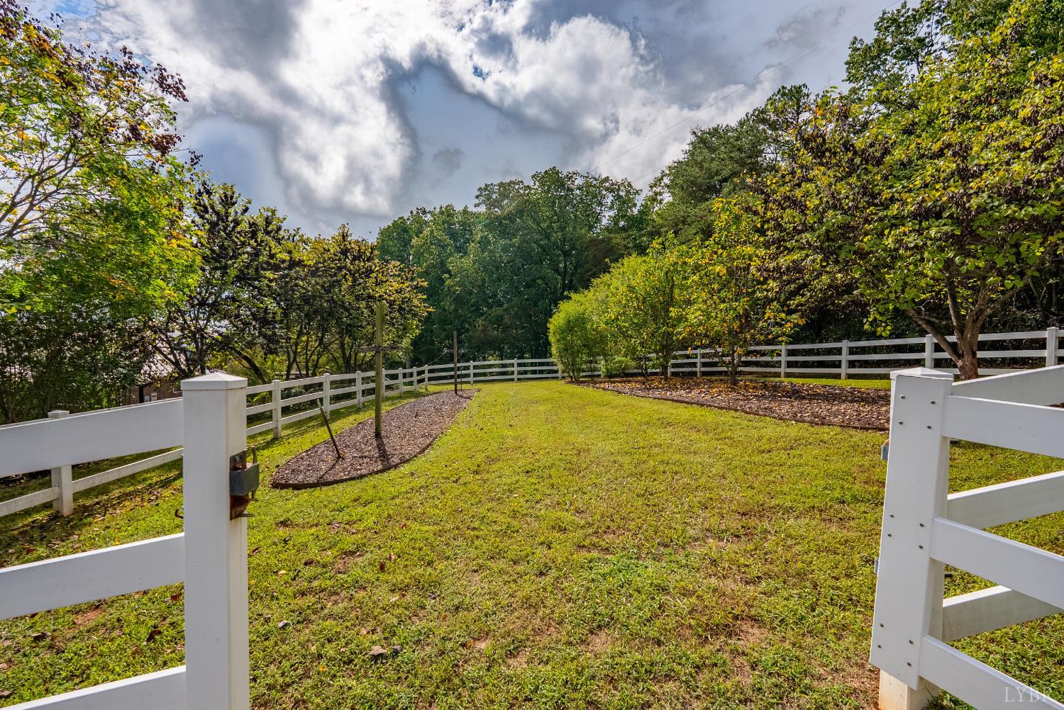 1704 Dearing Ford Road Altavista, VA 24517 - Photo 49 of 82 a view of a swimming pool with an outdoor seating and a yard
