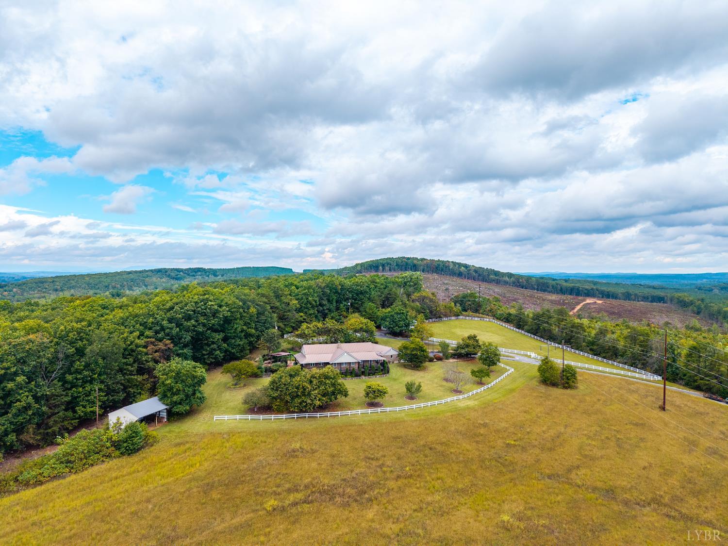 1704 Dearing Ford Road Altavista, VA 24517 - Photo 63 of 82 a view of a lake with a garden