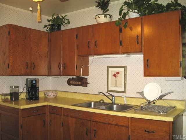 841 Cranbrook Road Raleigh, NC 27609 - Photo 4 of 10 Kitchen with ceiling fan & breakfast nook