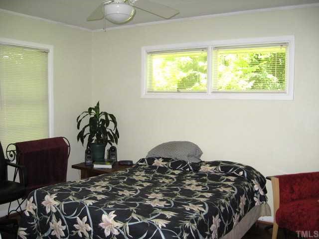 841 Cranbrook Road Raleigh, NC 27609 - Photo 7 of 10 Second bedroom with hardwoods