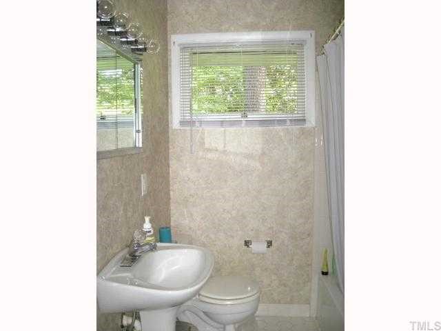 841 Cranbrook Road Raleigh, NC 27609 - Photo 9 of 10 Second full bath with pedestal sink