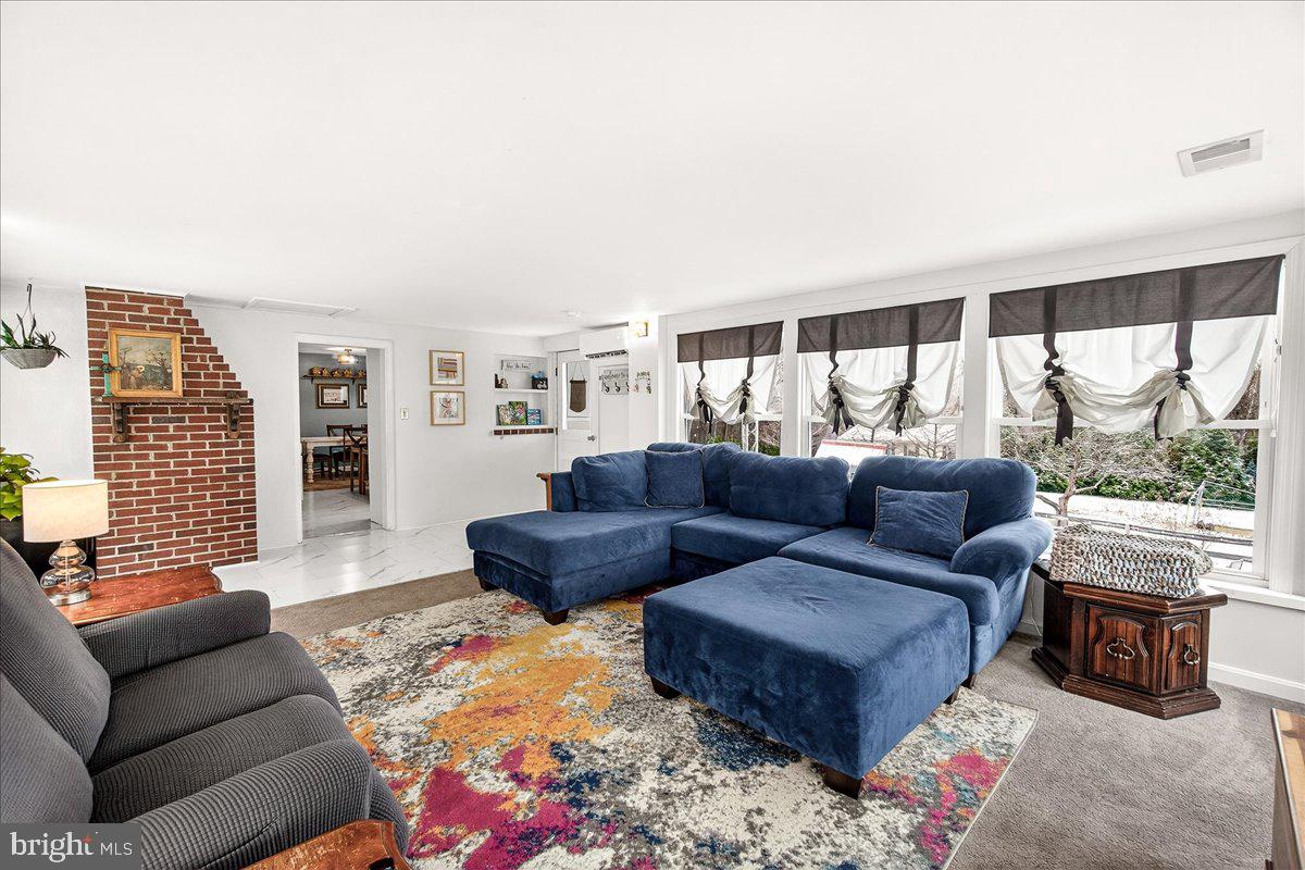 7201 Mountain Church Road Middletown, MD 21769 - Photo 19 of 37 a living room with furniture and a large window