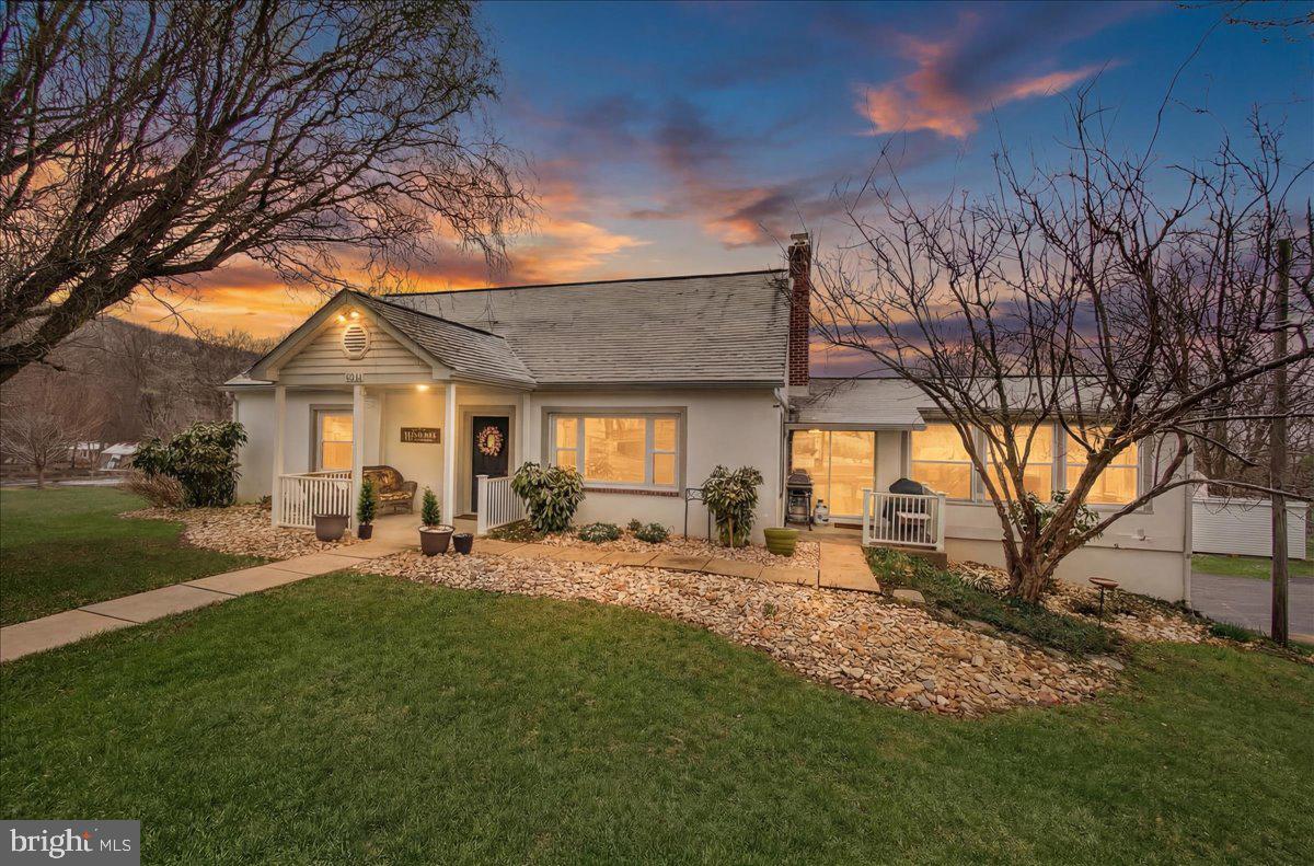 7201 Mountain Church Road Middletown, MD 21769 - Photo 2 of 37 a front view of house with yard and seating area