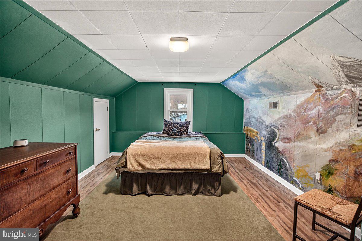 7201 Mountain Church Road Middletown, MD 21769 - Photo 25 of 37 a bedroom with a bed and a mirror