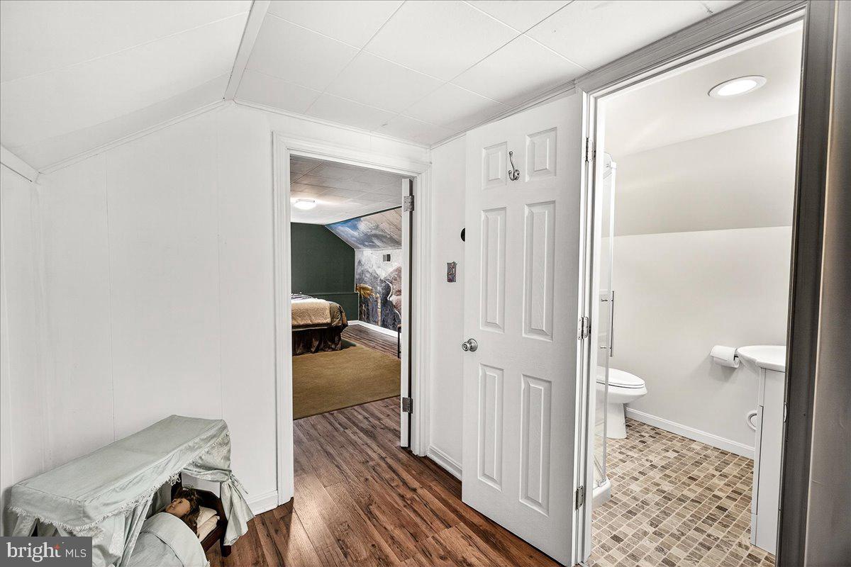 7201 Mountain Church Road Middletown, MD 21769 - Photo 29 of 37 a bathroom with a glass door shower