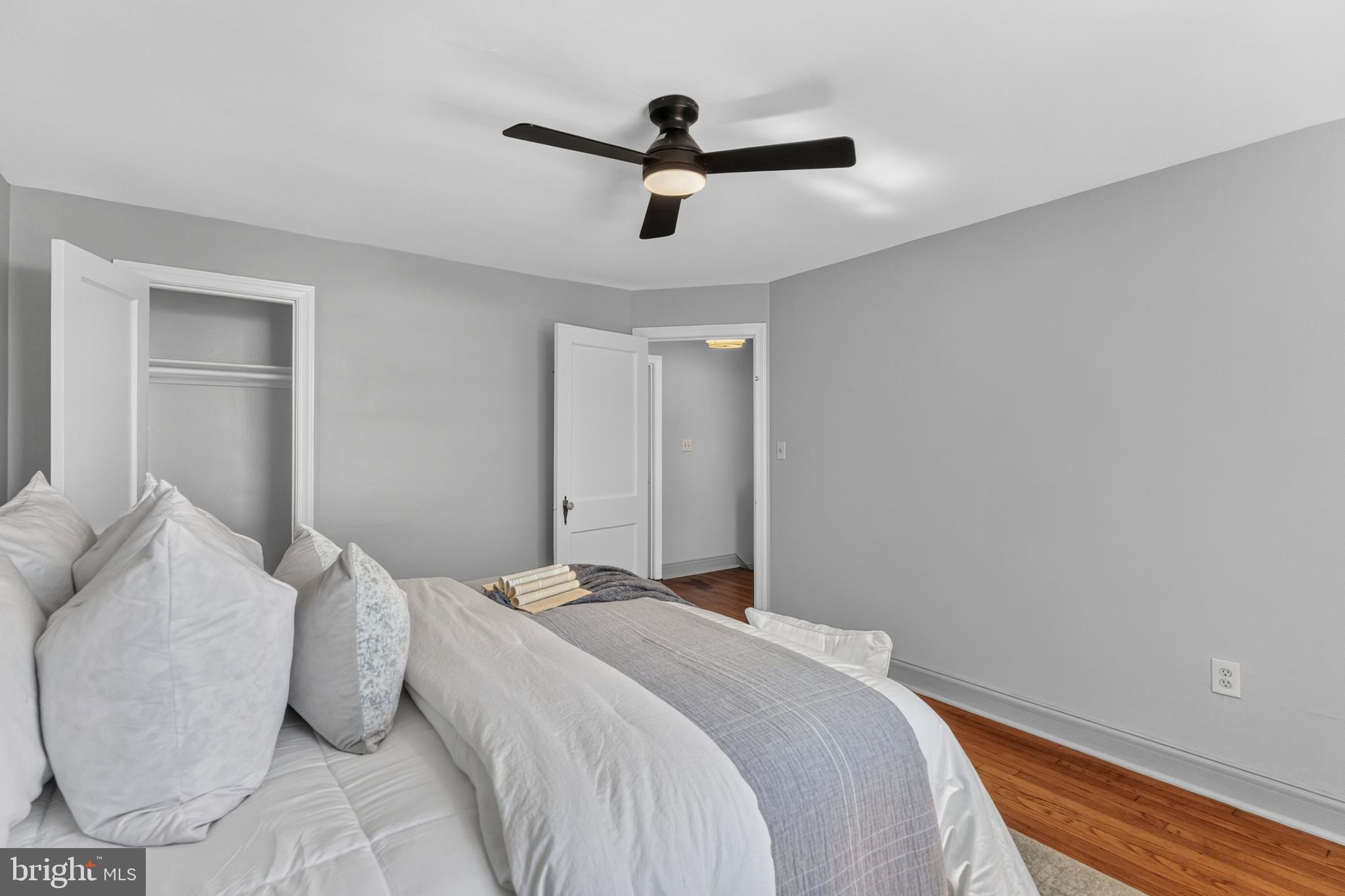 3906 Yolando Road Baltimore, MD 21218 - Photo 11 of 30 a bedroom with a bed and a ceiling fan