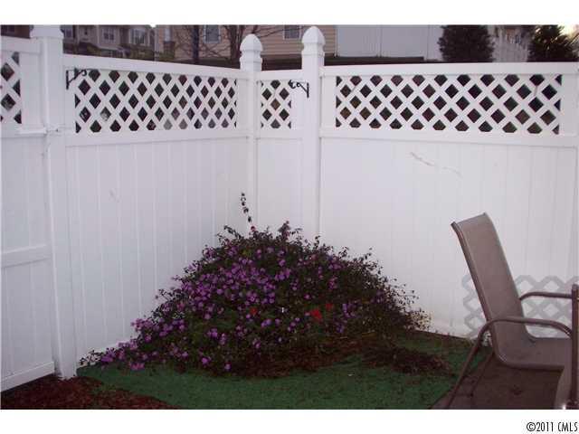 958 Copperstone Lane, Unit 162 Fort Mill, SC 29708 - Photo 13 of 14 a view of a wooden fence