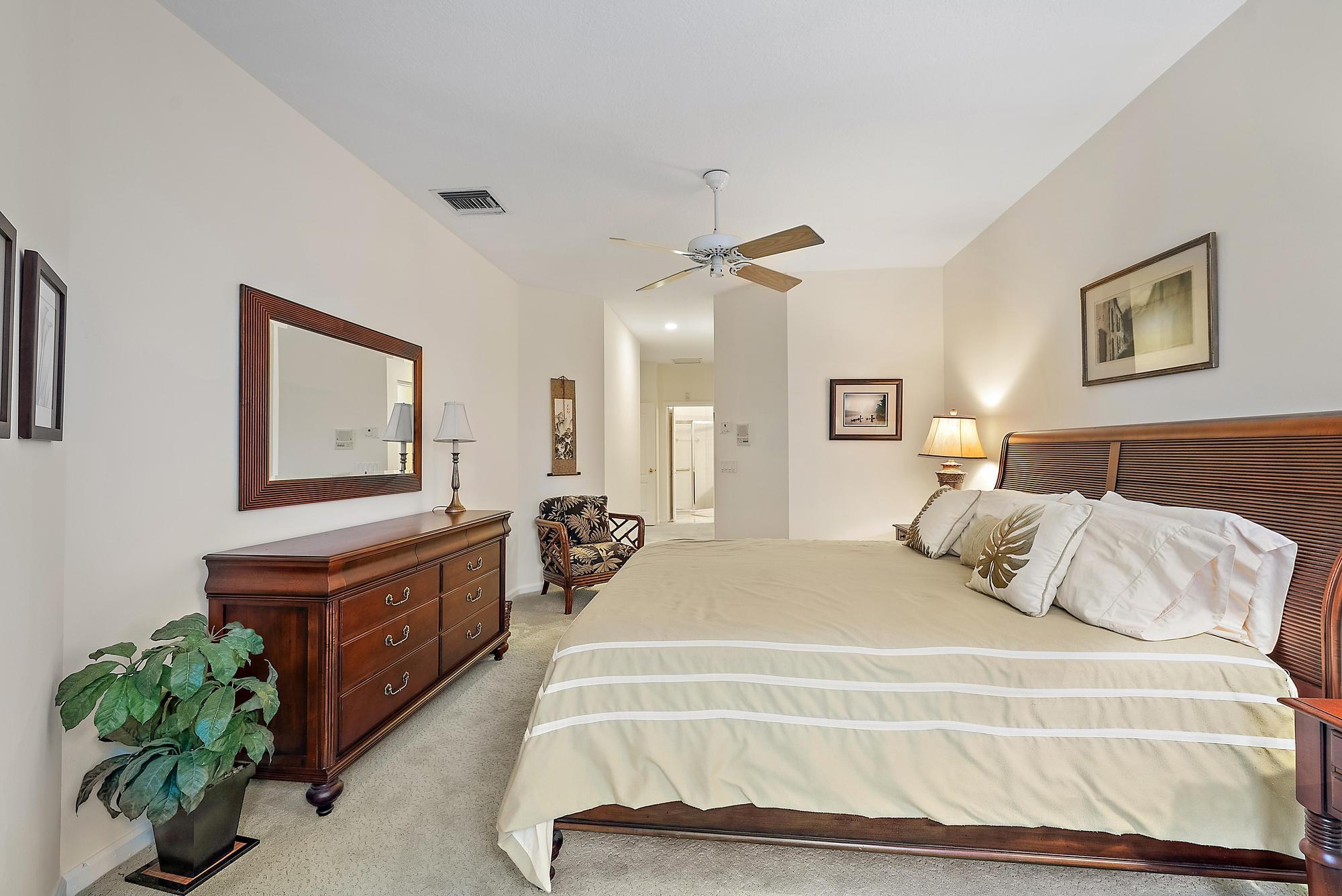 575 Masters Way Palm Beach Gardens, FL 33418 - Photo 15 of 42 Primary Suite