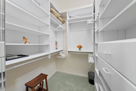 a view of storage and utility room with empty racks