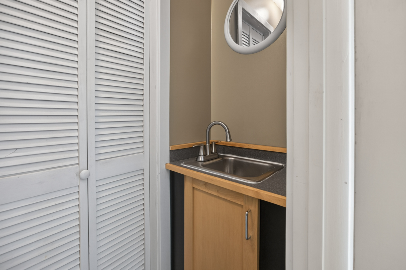 18 Mc Cormick Boulevard Normal, IL 61761 - Photo 11 of 25 a bathroom with a sink and a window