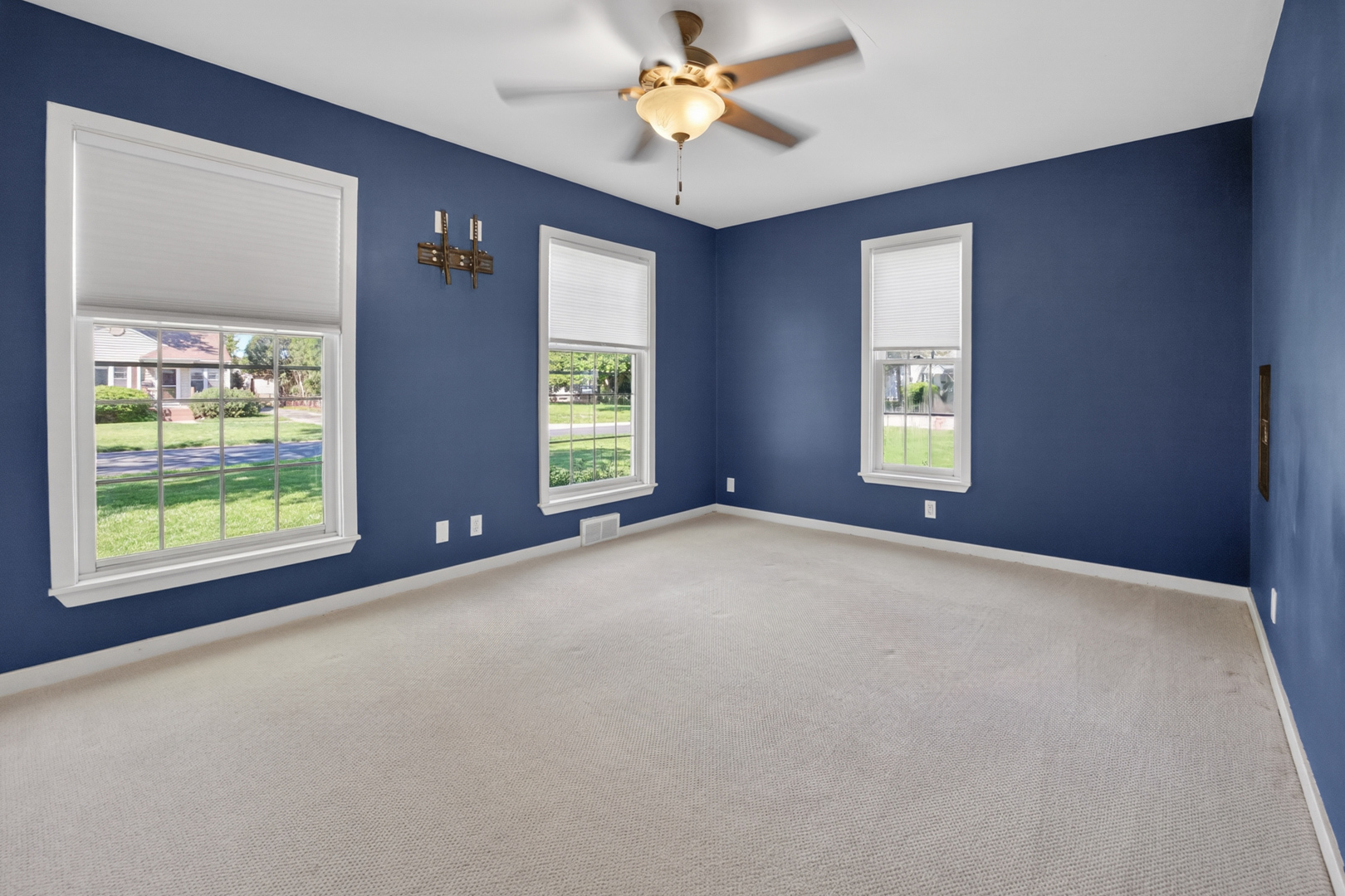 18 Mc Cormick Boulevard Normal, IL 61761 - Photo 13 of 25 an empty room with windows and fan