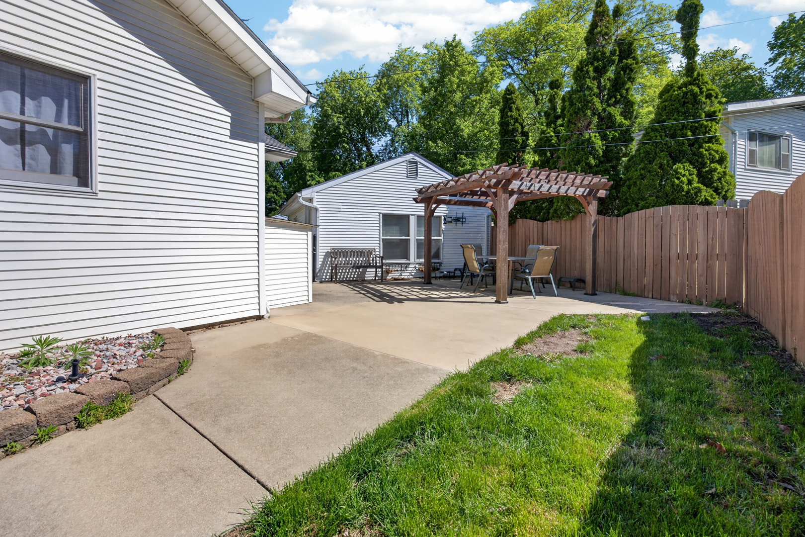 18 Mc Cormick Boulevard Normal, IL 61761 - Photo 18 of 25 a house view with a garden space