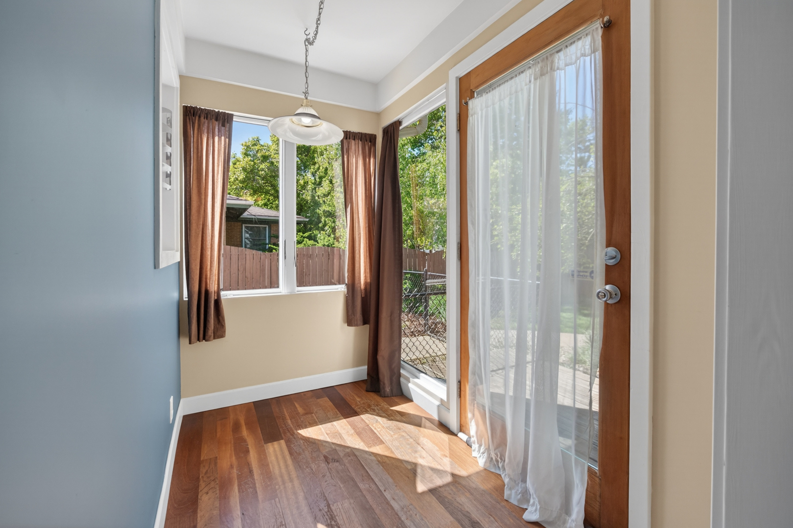 18 Mc Cormick Boulevard Normal, IL 61761 - Photo 2 of 25 a view of a room with wooden floor and windows