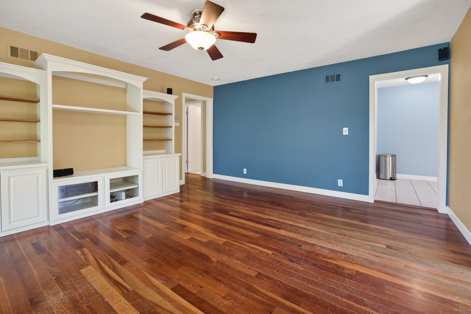 18 Mc Cormick Boulevard Normal, IL 61761 - Photo 3 of 25 a view of empty room with wooden floor and fan