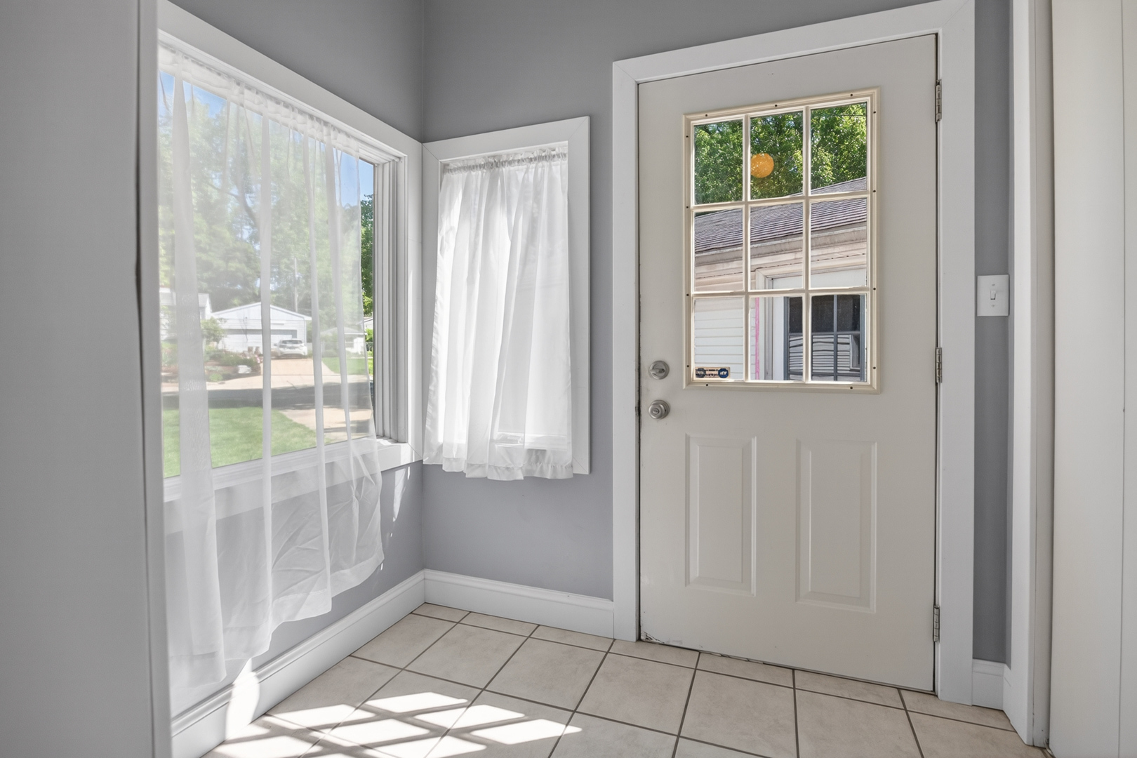 18 Mc Cormick Boulevard Normal, IL 61761 - Photo 10 of 25 a view of an empty room and window