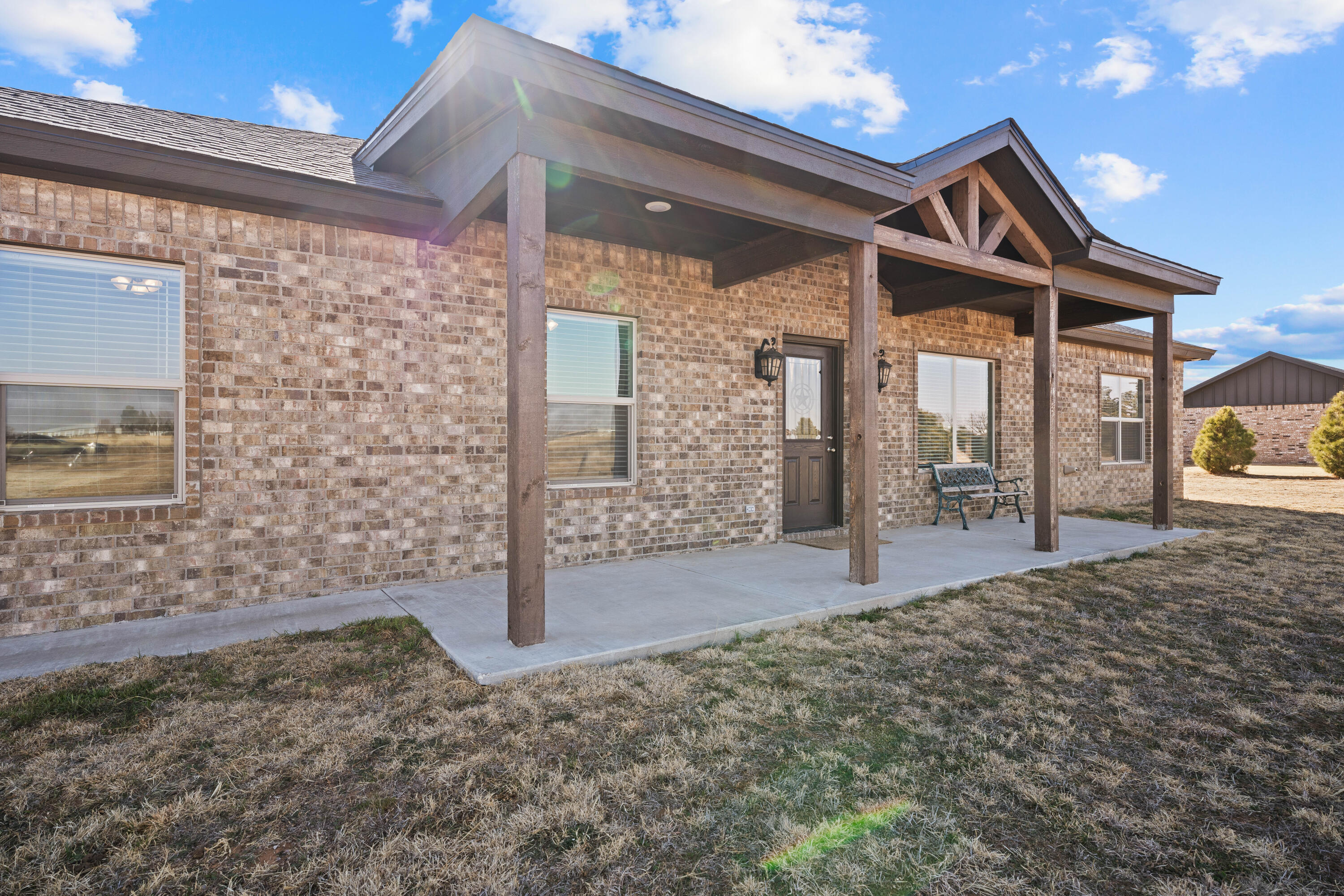 8907 County Road 6100 Shallowater, TX 79363 - Photo 2 of 24 a front view of a house with a yard