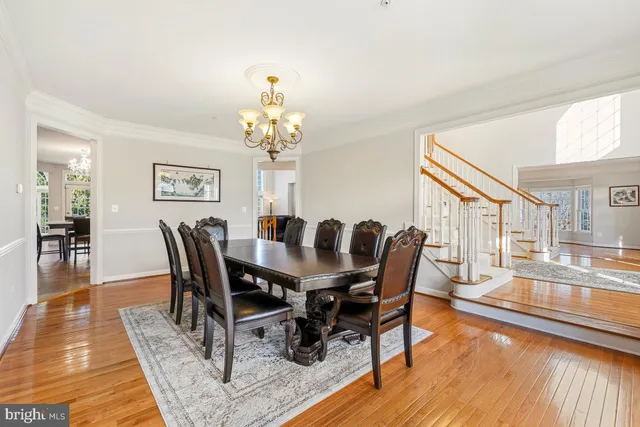a kitchen with stainless steel appliances granite countertop a stove top oven sink and cabinets