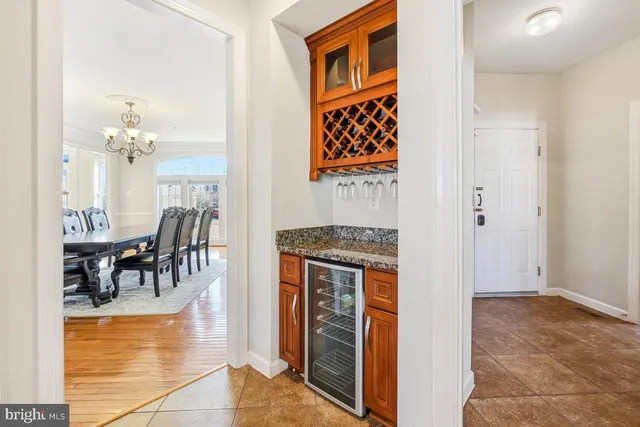 a kitchen with granite countertop cabinets stainless steel appliances granite countertop a sink and a window