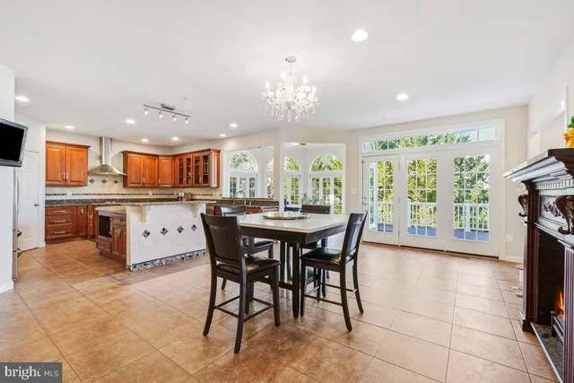 a kitchen with granite countertop stainless steel appliances and counter space