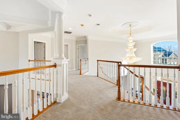 a bedroom with a bed dresser and a window