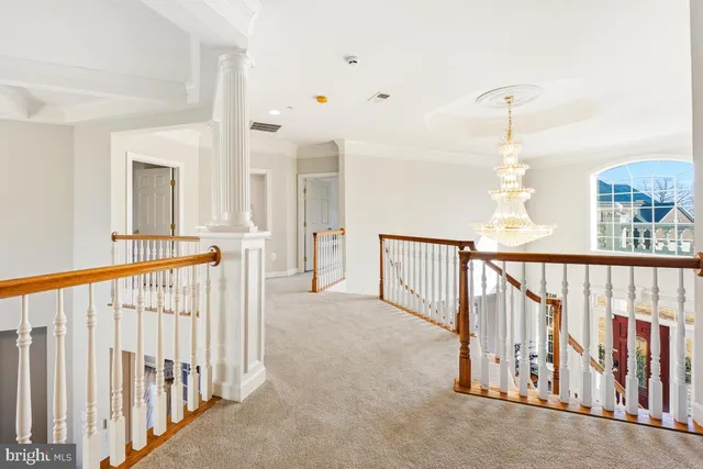 a bedroom with a bed dresser and a window