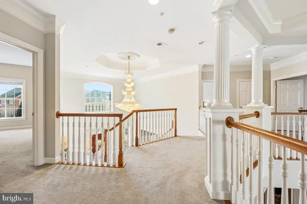 a bathroom with a sink a toilet a mirror and shower
