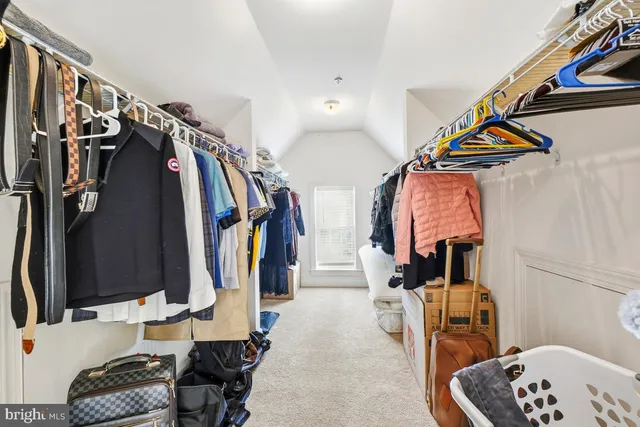 a open kitchen with a table and chairs in it