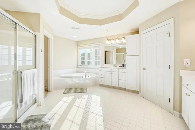 a view of a hallway with wooden shelves