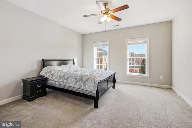 a kitchen with stainless steel appliances granite countertop a refrigerator sink and cabinets