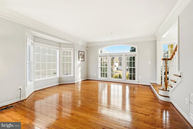 a bathroom with a sink mirror and toilet