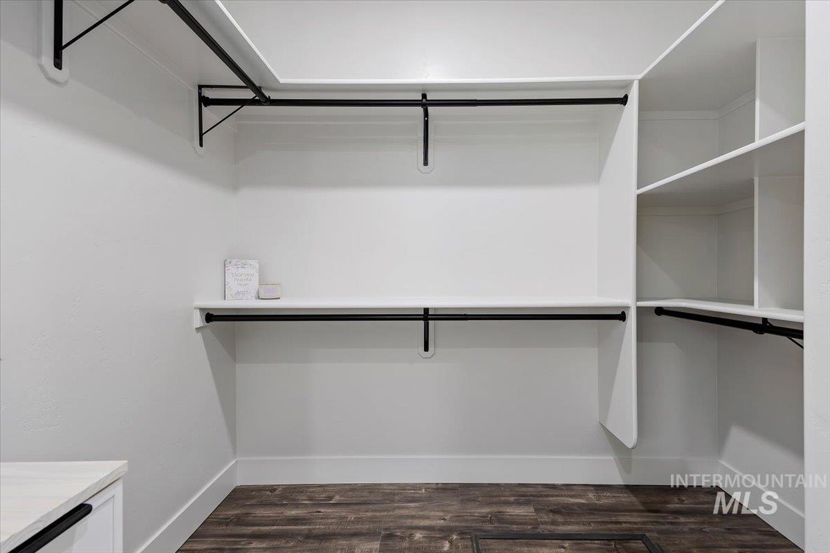1189 Trail Crest Road Twin Falls, ID 83301 - Photo 24 of 44 Walk in closet with dark wood-style floors