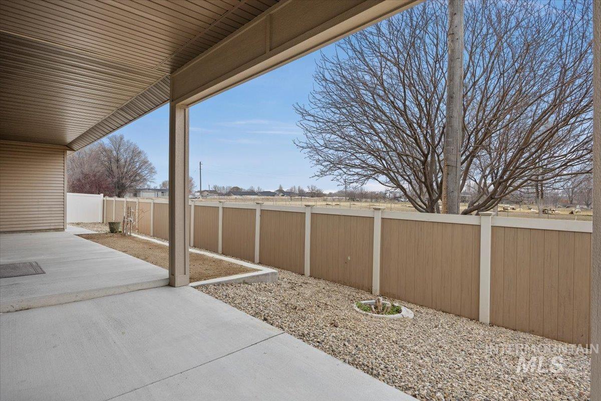 1189 Trail Crest Road Twin Falls, ID 83301 - Photo 29 of 44 Fenced backyard with a patio area
