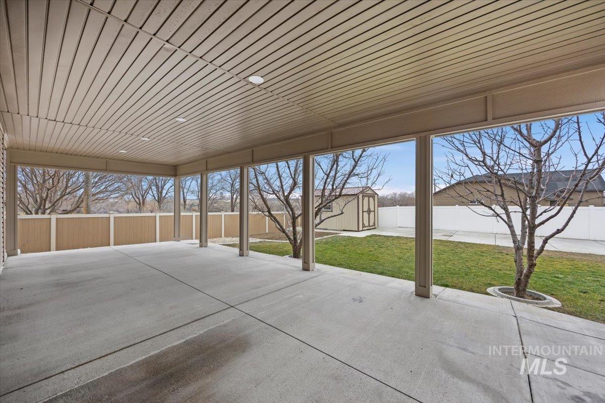 1189 Trail Crest Road Twin Falls, ID 83301 - Photo 34 of 44 Fenced backyard featuring a storage shed