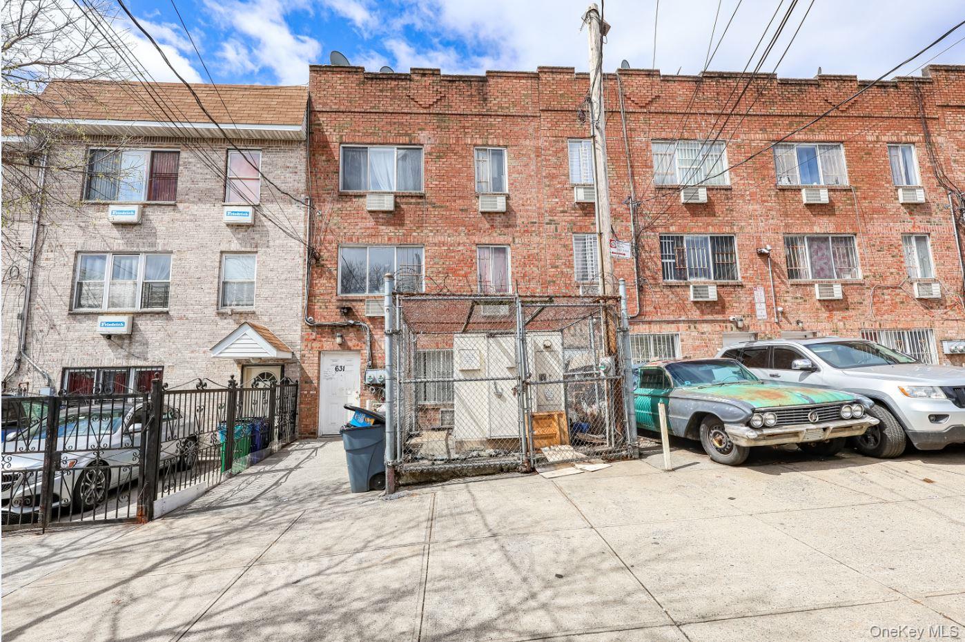 631 Coster Street Bronx, NY 10474 - Photo 3 of 17 a car parked in front of a building