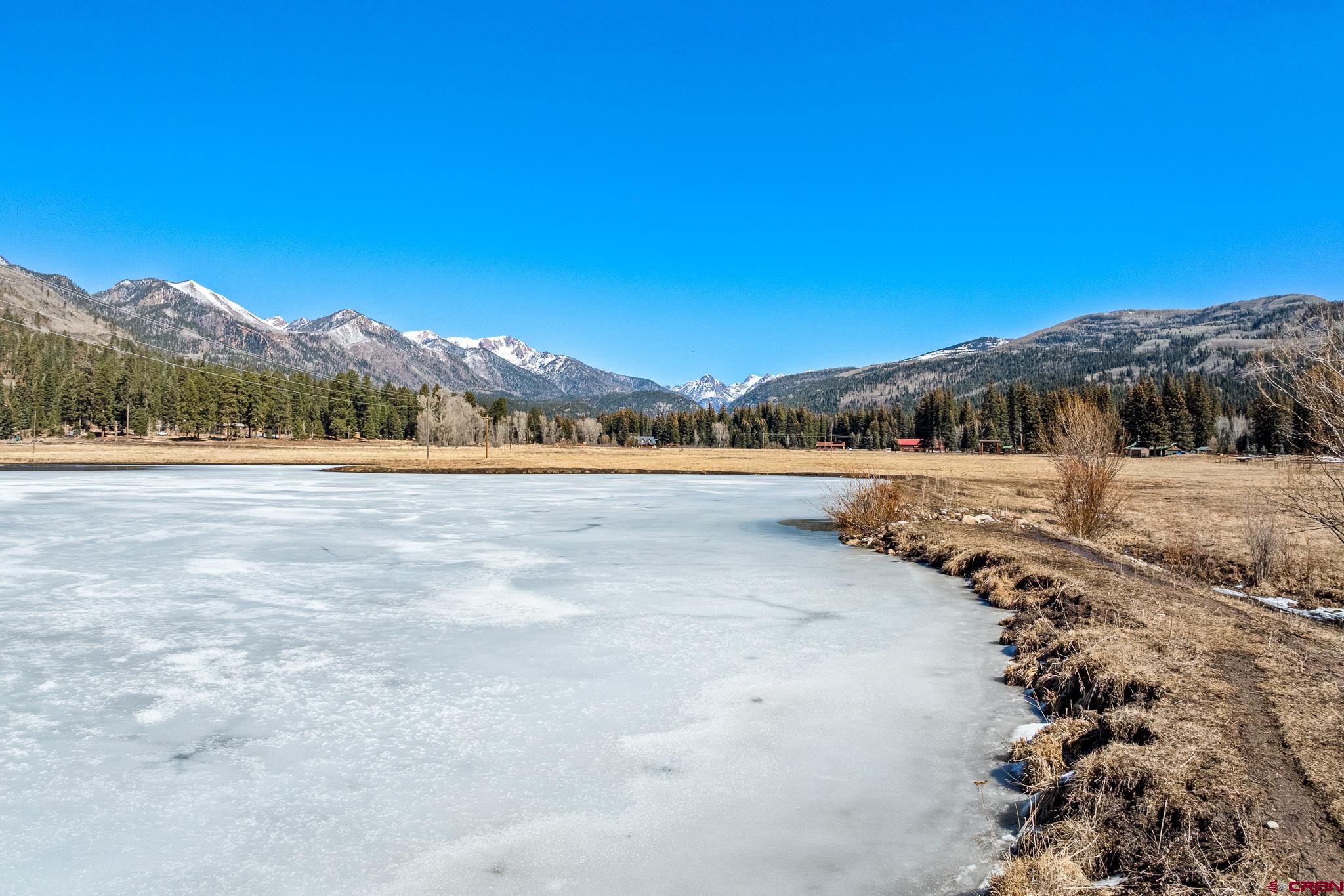 156 Golden Forest Road Bayfield, CO 81122 - Photo 13 of 28 a view of lake with mountain in the background
