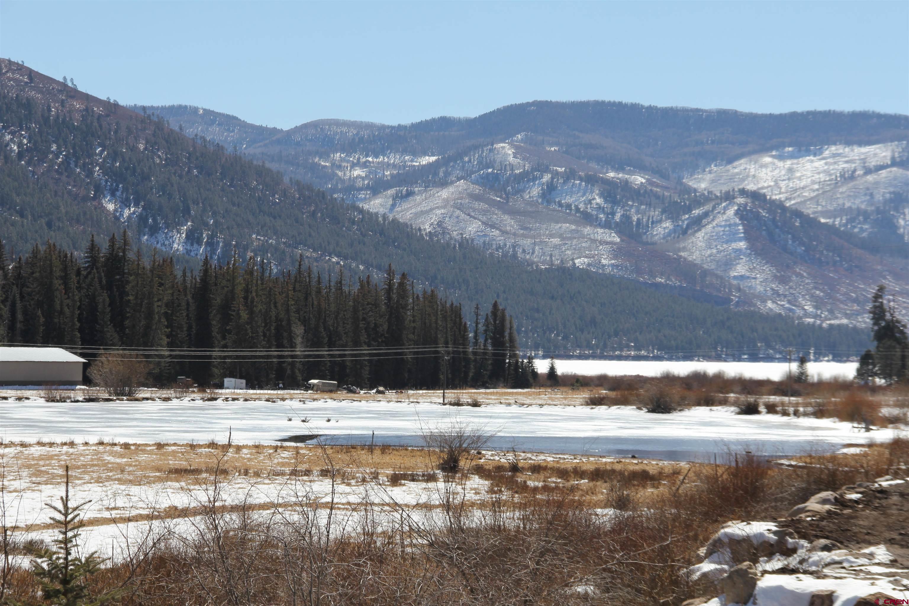 156 Golden Forest Road Bayfield, CO 81122 - Photo 25 of 28 a swimming pool view with a lake view