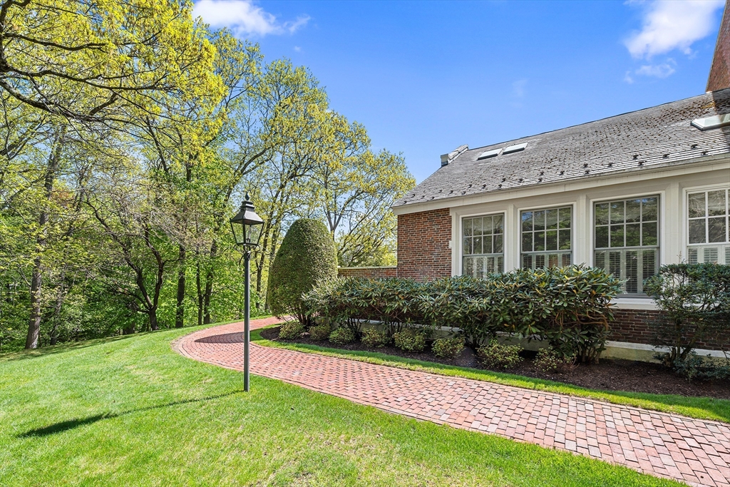 63 Garden Road, Unit C5 Wellesley, MA 02481 - Photo 27 of 30 a view of a house with backyard and garden