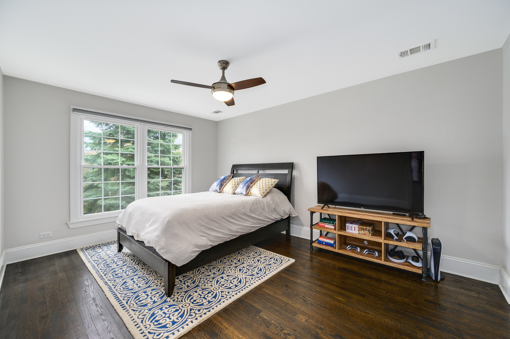 808 Rolling Pass Glenview, IL 60025 - Photo 21 of 33 a bedroom with furniture and a flat screen tv