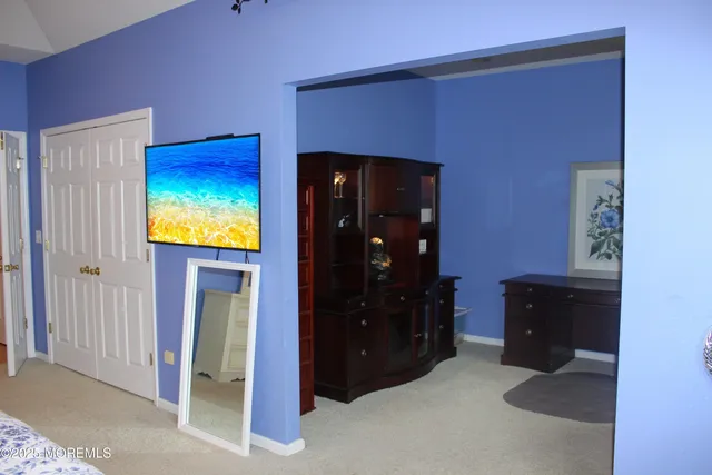 a living room with closet