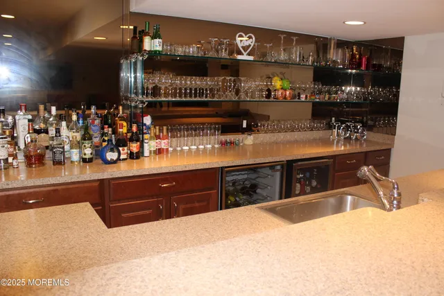 a room with wooden floor and furniture