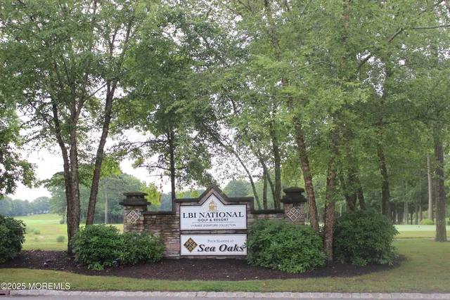 a view of a swimming pool with a table and chairs