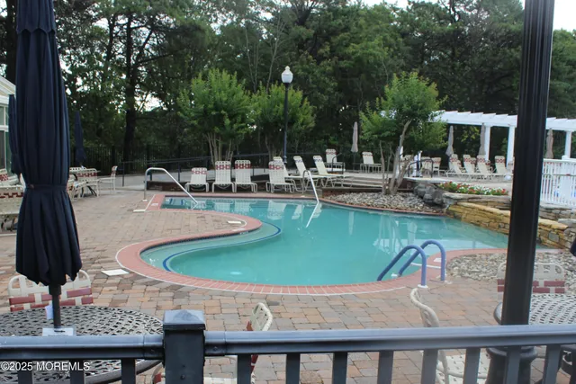 a view of a car park in front of house