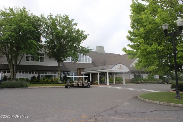 a view of a golf course with a lake