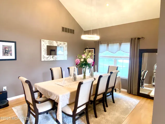 a view of a dining room with furniture