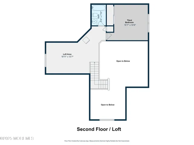 a picture of a bathroom with a white wall and a picture
