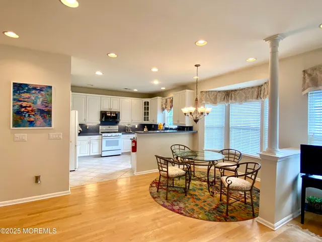 a view of a dining room with furniture