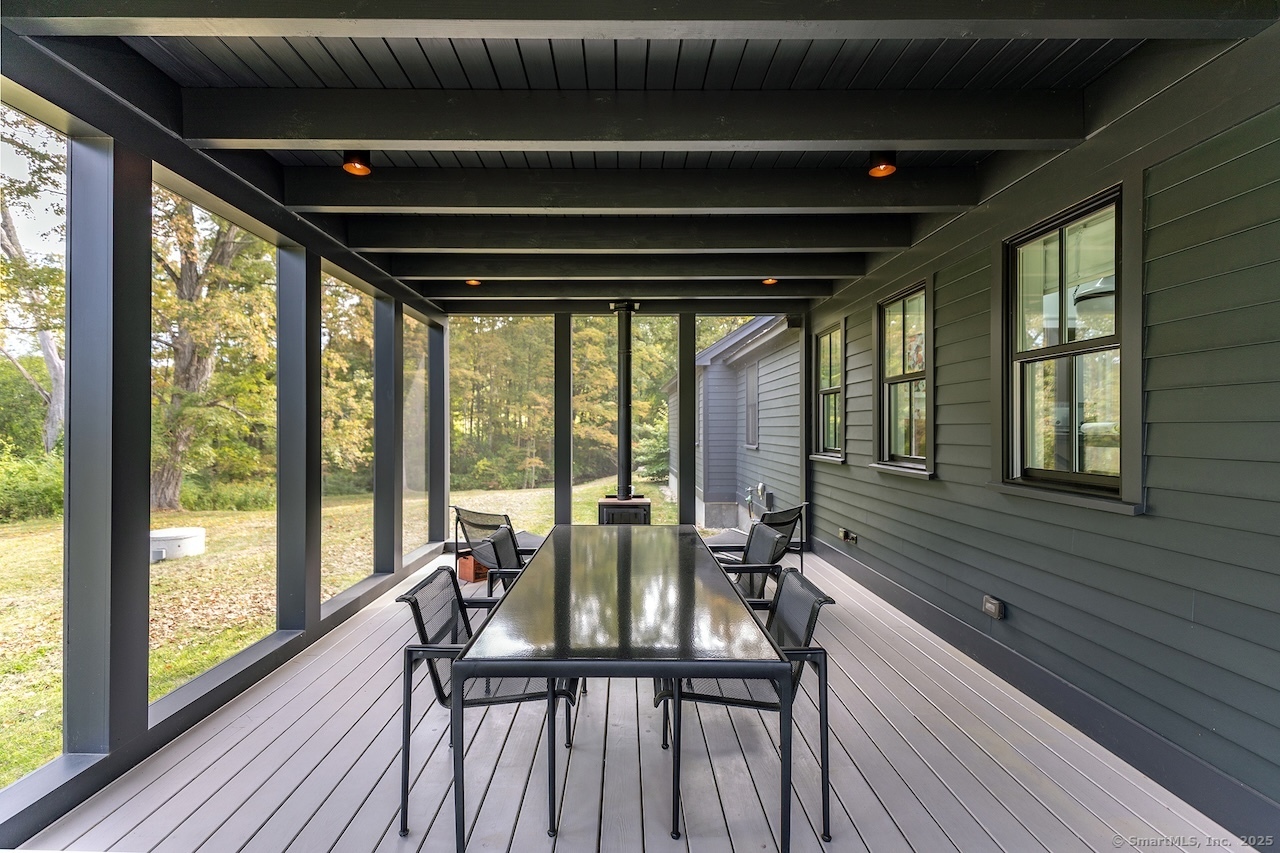 30 Knibloe Hill Road Sharon, CT 06069 - Photo 15 of 32 a view of a room with furniture and wooden floor