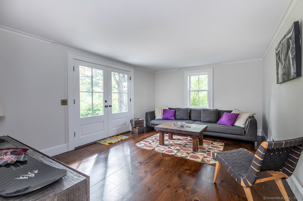 30 Knibloe Hill Road Sharon, CT 06069 - Photo 17 of 32 a living room with furniture and a window