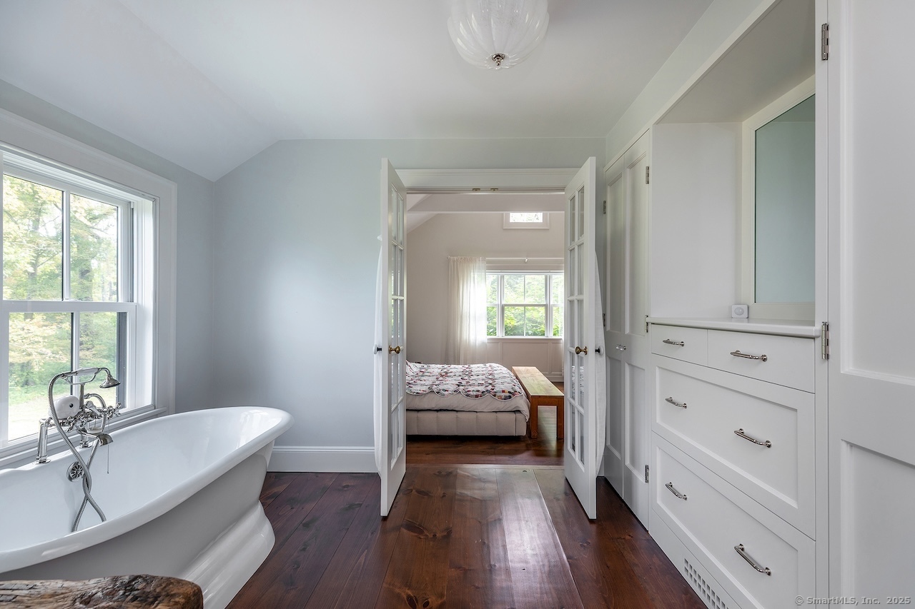 30 Knibloe Hill Road Sharon, CT 06069 - Photo 23 of 32 a room with a bed and a window