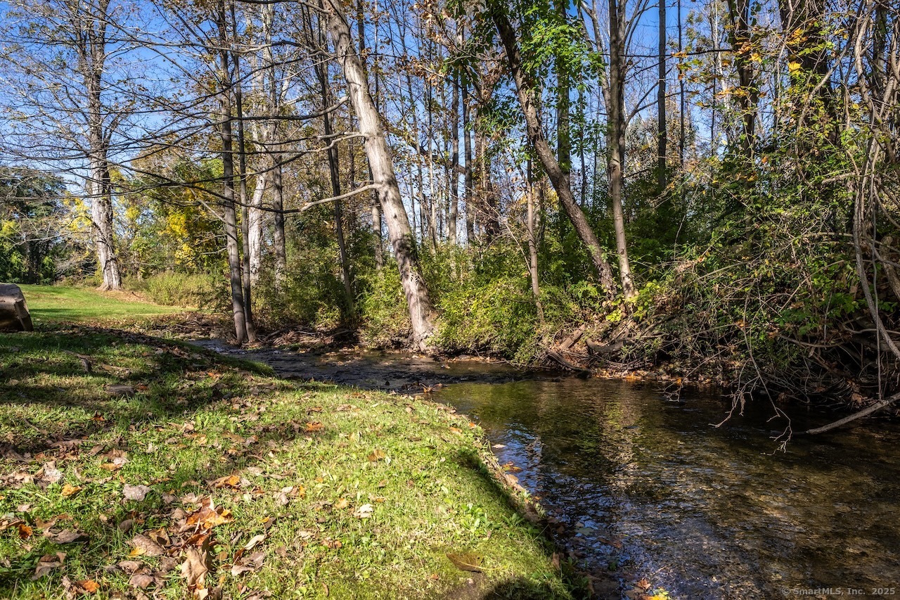 30 Knibloe Hill Road Sharon, CT 06069 - Photo 3 of 32 a view of a lake with houses